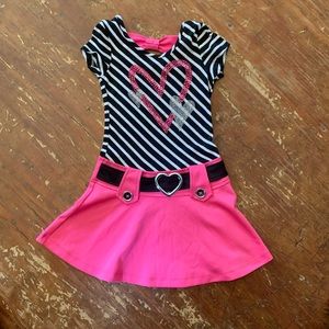 Black and white striped dress with pink accents